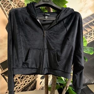 Black women’s velvet long sleeve sweater.